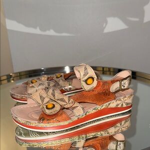 Spring Step Orange and Cream Sandals with Artistic Design